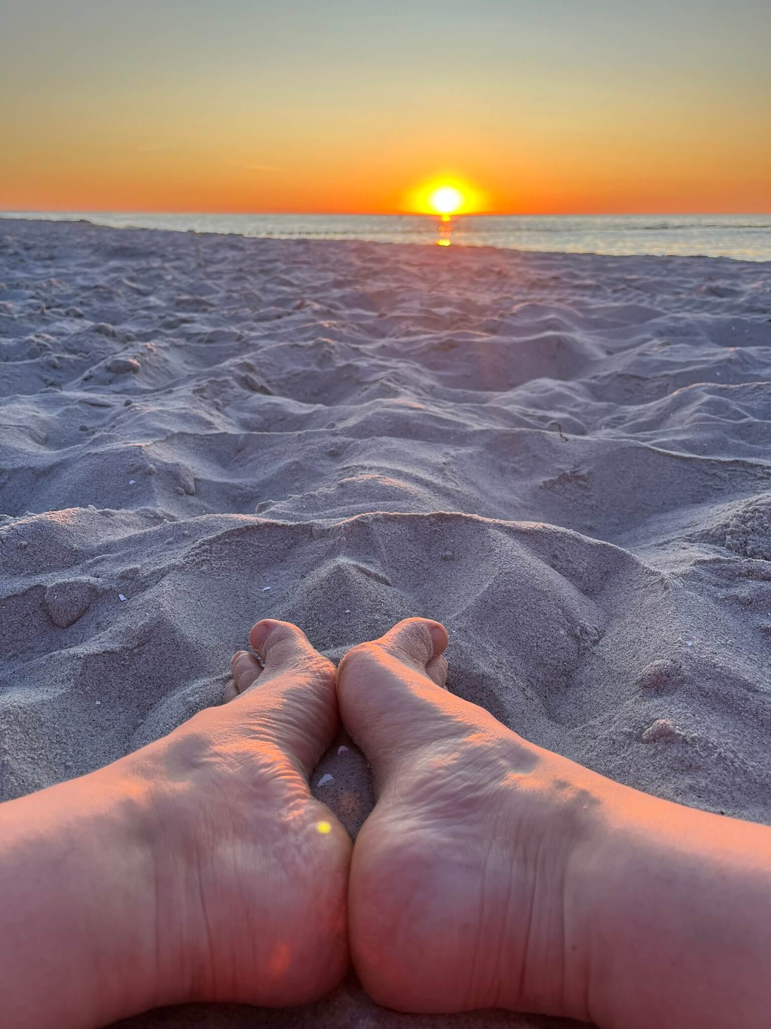 Füße im Sonnenuntergang